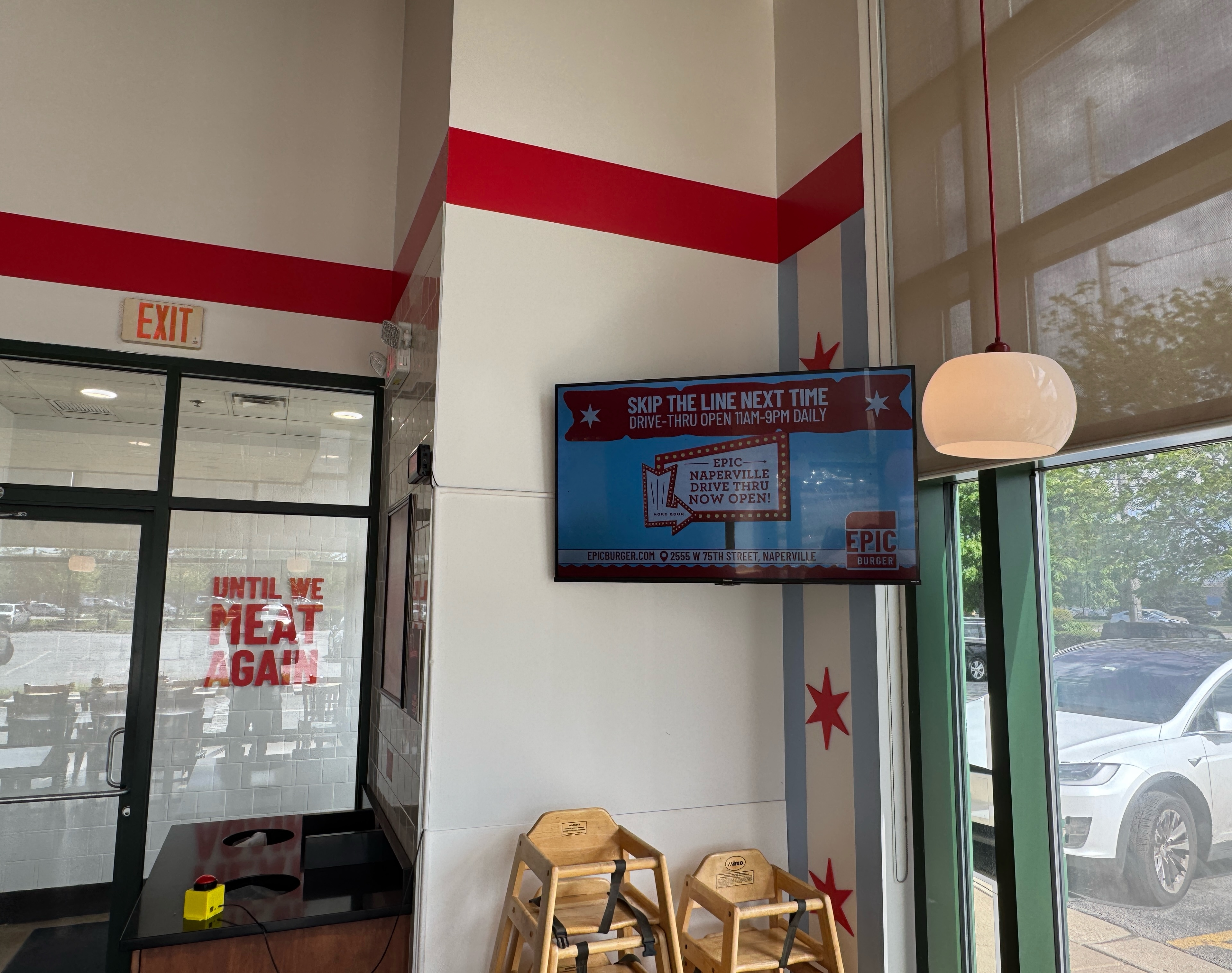 DDM digital advertising screen operating inside a busy local venue