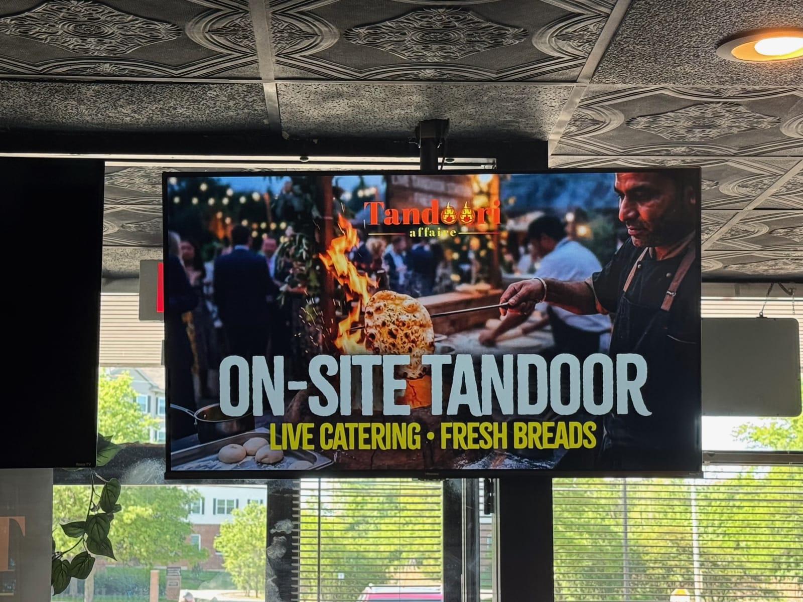 Indoor digital advertising screen at Tandoori Affaire in Naperville