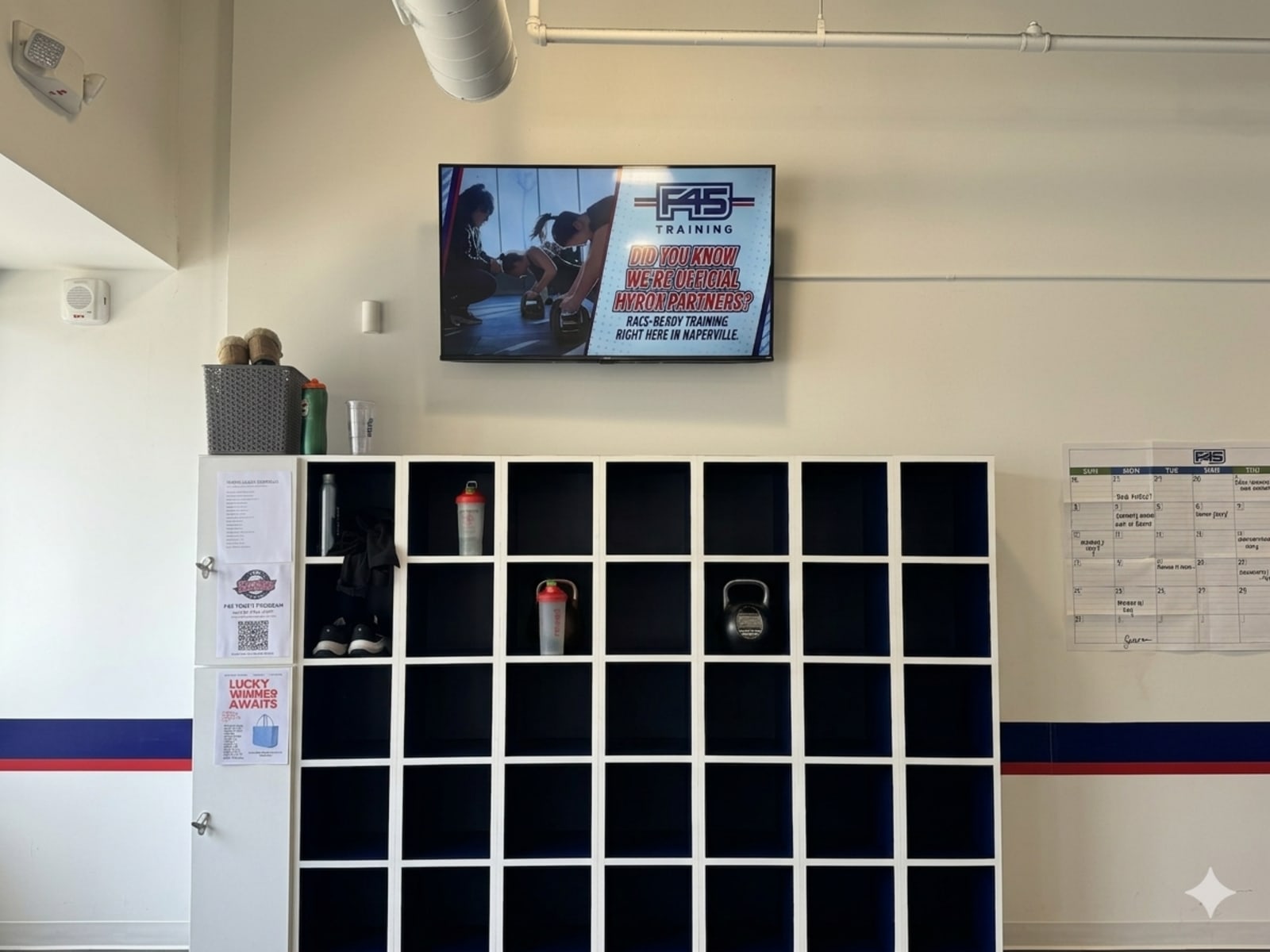 DDM advertising screen installed inside F45 Training Naperville