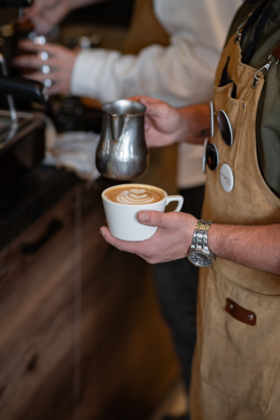 Barista pouring latte art